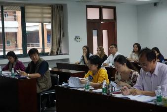 The members of review committee listening to students reports The members of review committee listening to students reports