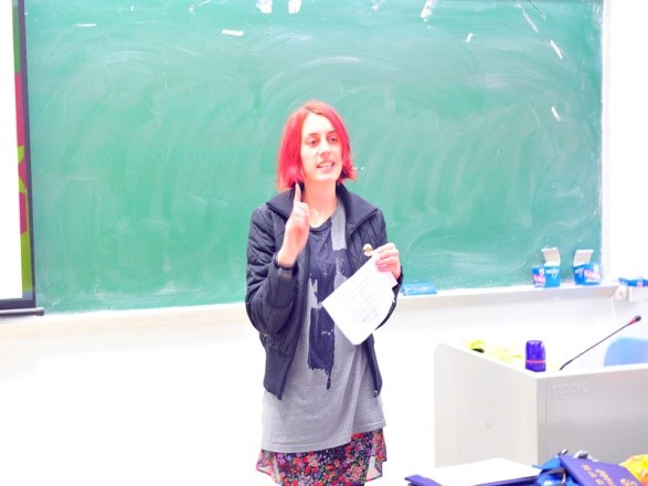 Lucy is giving a speech