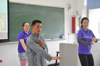 Six students are presenting a Kung Fu performance